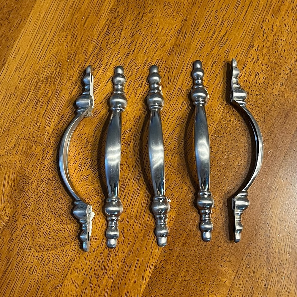 Brushed nickel bathroom cabinet handles and lighting plates